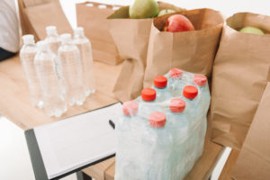 groceries, clipboard, charity goods